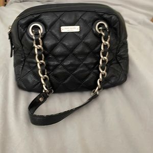 Black Kate Spade purse.